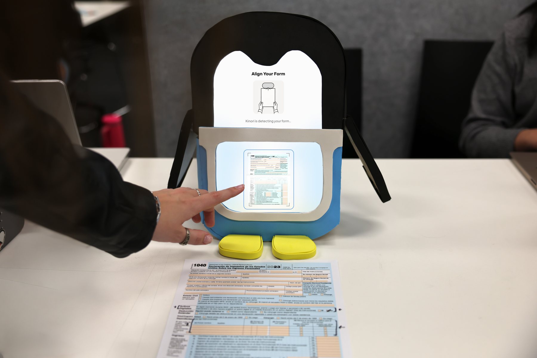Kinori translating a form placed in front of it